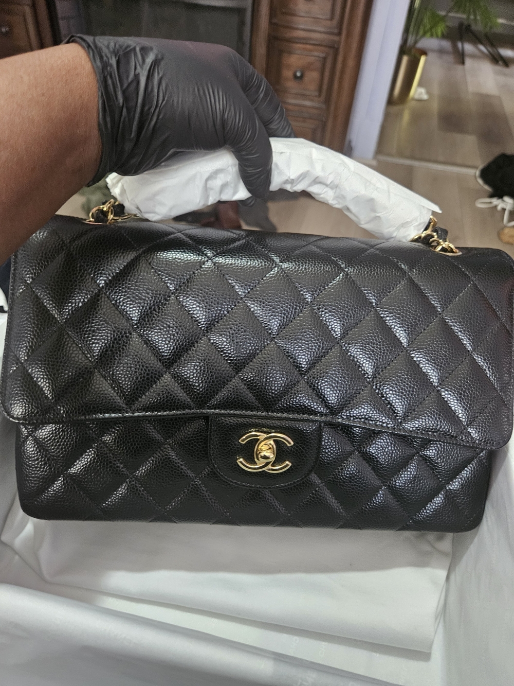 Chanel Classic Flap Bag in Black Caviar with Gold Hardware